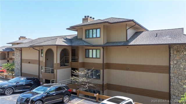 32 Cedar Ct Unit 3A, Lake Ozark, MO 65049 - view of property with uncovered parking