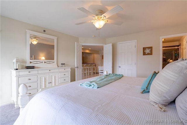 bedroom featuring carpet floors and ceiling fan