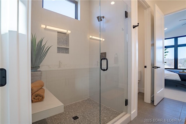 1152 Normandy Rd, Osage Beach, MO 65065 - full bath featuring healthy amount of natural light, tile patterned floors, connected bathroom, and a shower stall