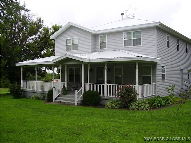 3521 S 240th Rd, Mo, MO 65685 - farmhouse-style home with covered porch, a front yard, and metal roof