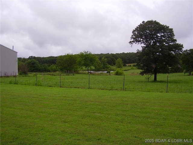 3521 S 240th Rd, Mo, MO 65685 - view of yard featuring fence