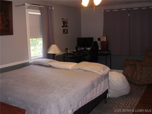 3521 S 240th Rd, Mo, MO 65685 - bedroom featuring baseboards and wood finished floors