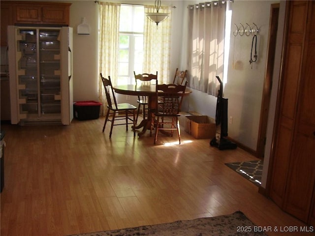 3521 S 240th Rd, Mo, MO 65685 - dining space featuring wood finished floors