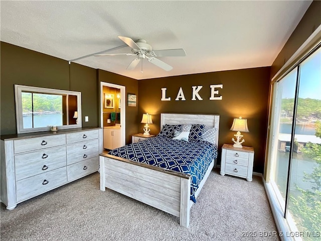 405 Barba Le Ln Unit 3B, Lake Ozark, MO 65049 - bedroom with access to outside, carpet, and a ceiling fan