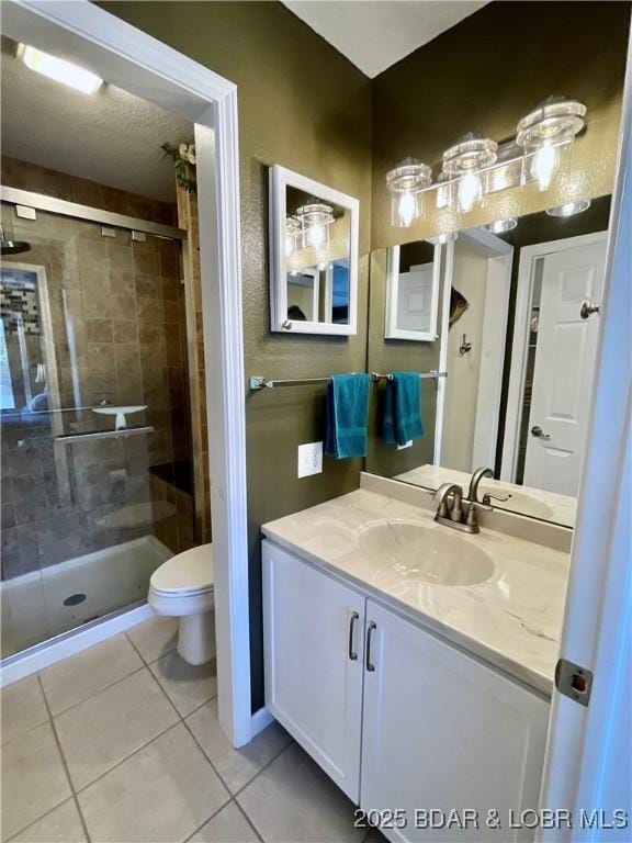 405 Barba Le Ln Unit 3B, Lake Ozark, MO 65049 - full bathroom with toilet, tile patterned floors, a shower stall, and vanity