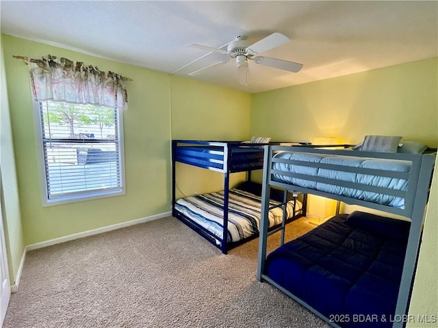 405 Barba Le Ln Unit 3B, Lake Ozark, MO 65049 - carpeted bedroom with baseboards and a ceiling fan