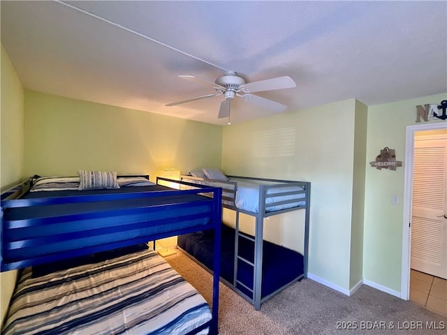 405 Barba Le Ln Unit 3B, Lake Ozark, MO 65049 - bedroom with baseboards, carpet, and ceiling fan