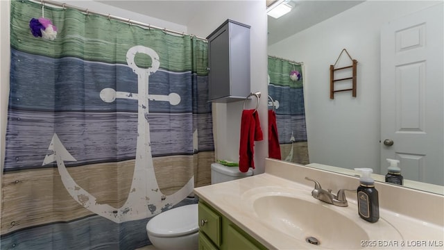 288 Windsor Bay Dr Unit 4B, Camdenton, MO 65020 - bathroom featuring toilet, vanity, and a shower with shower curtain