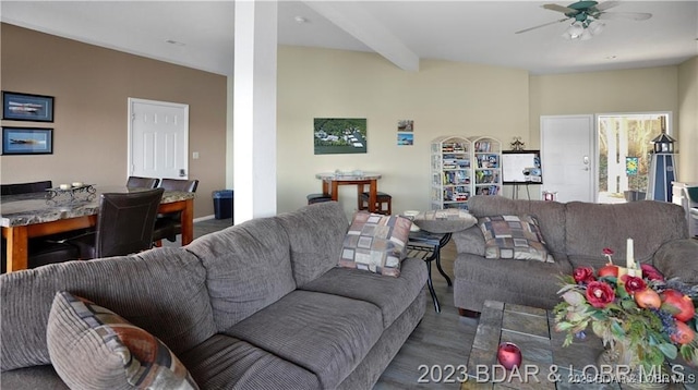 288 Windsor Bay Dr Unit 4B, Camdenton, MO 65020 - living area featuring a ceiling fan, wood finished floors, and beamed ceiling