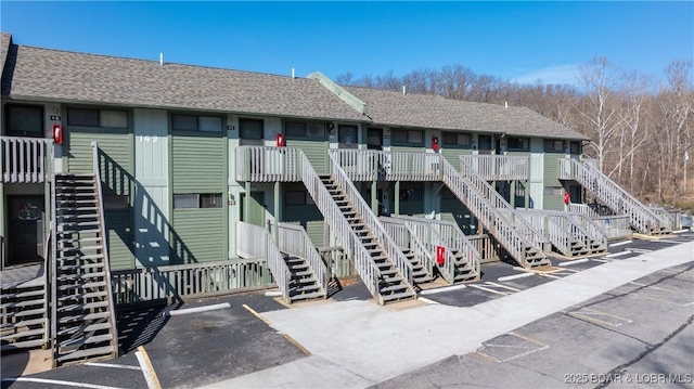 149 Southwood Shores Pl Unit 1B, Lake Ozark, MO 65049 - view of building exterior featuring stairway