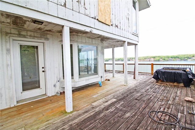 1483 Bluff Dr, Osage Beach, MO 65065 - wooden deck with a water view