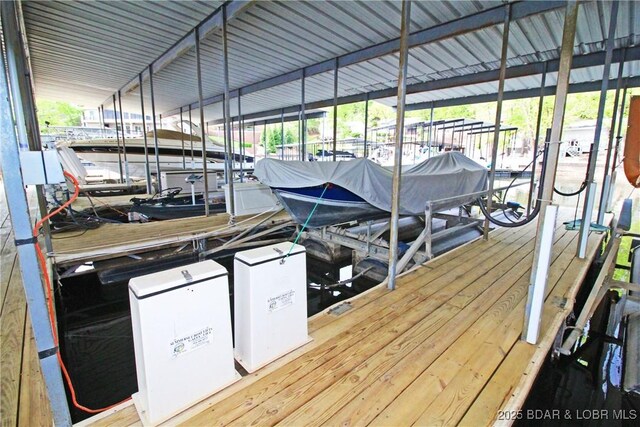 1483 Bluff Dr, Osage Beach, MO 65065 - dock area with boat lift