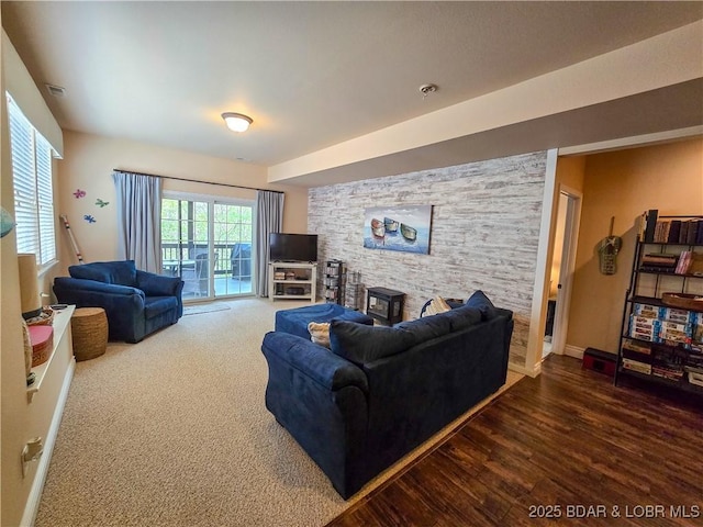 212 Weiskopf Way, Camdenton, MO 65020 - living room featuring wood finished floors and a wood stove