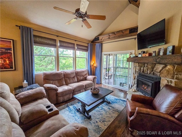 212 Weiskopf Way, Camdenton, MO 65020 - living room featuring wood finished floors, ceiling fan, high vaulted ceiling, and a fireplace