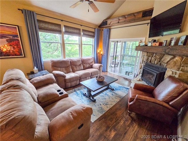 living room with a fireplace, a ceiling fan, wood finished floors, and lofted ceiling