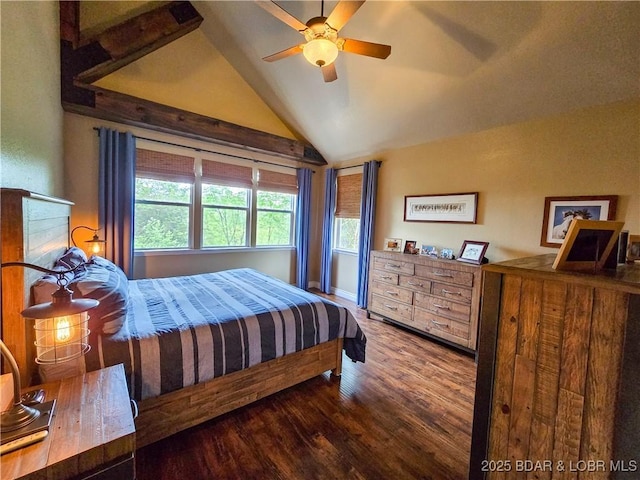 bedroom with wood finished floors and vaulted ceiling