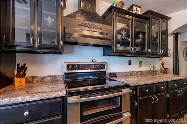 106 Bayliner Dr, Sunrise Beach, MO 65079 - kitchen featuring double oven range, premium range hood, and glass insert cabinets
