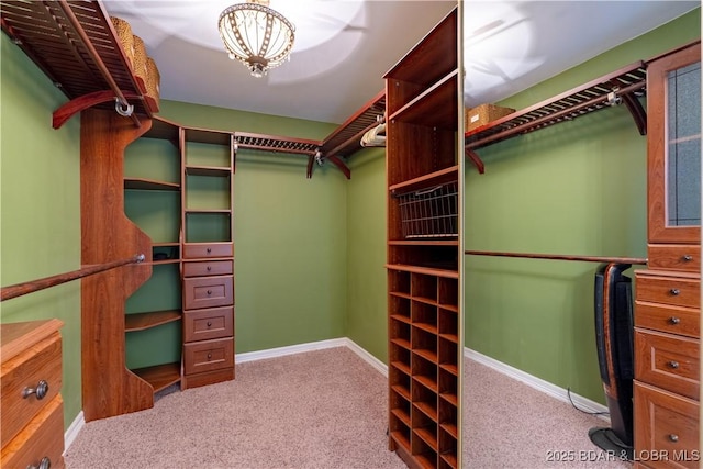 106 Bayliner Dr, Sunrise Beach, MO 65079 - spacious closet featuring carpet and an inviting chandelier
