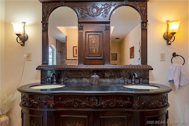 106 Bayliner Dr, Sunrise Beach, MO 65079 - bathroom featuring a sink, double vanity, and decorative backsplash