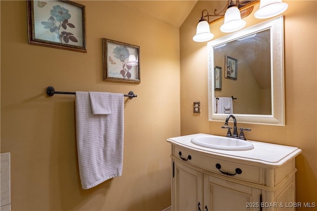 106 Bayliner Dr, Sunrise Beach, MO 65079 - bathroom featuring vanity and lofted ceiling