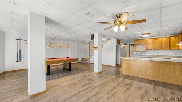 168 Shady Oaks Cir, Sunrise Beach, MO 65079 - kitchen with baseboards, light wood finished floors, visible vents, light countertops, and billiards