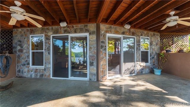 168 Shady Oaks Cir, Sunrise Beach, MO 65079 - exterior space with ceiling fan, a patio area, and stone siding