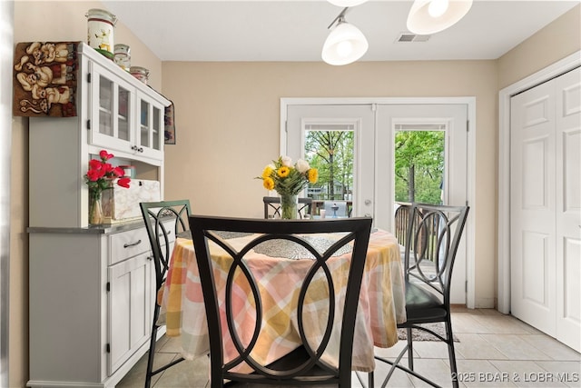 1497 Cherokee Rd W, Lake Ozark, MO 65049 - dining area featuring visible vents and light tile patterned floors