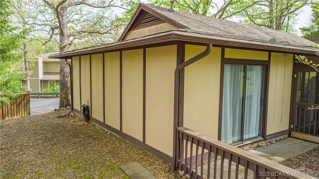 294 Moongate Dr, Osage Beach, MO 65065 - view of side of home with a shingled roof