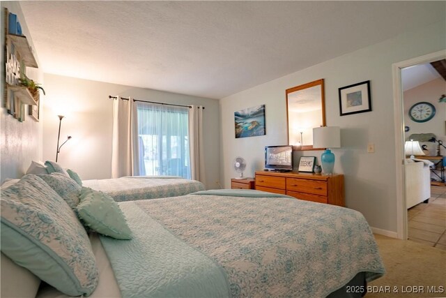 294 Moongate Dr, Osage Beach, MO 65065 - bedroom with baseboards and light carpet