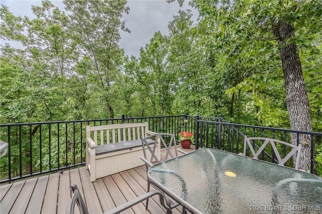 wooden deck with outdoor dining area