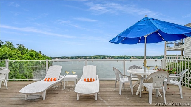 72 Emerald Bay Dr Unit 2D, Lake Ozark, MO 65049 - wooden deck featuring outdoor dining area