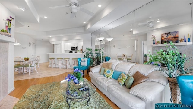 72 Emerald Bay Dr Unit 2D, Lake Ozark, MO 65049 - living area with recessed lighting, ceiling fan, and light tile patterned floors