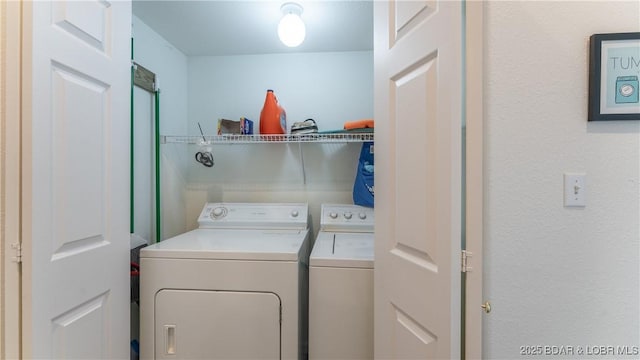 72 Emerald Bay Dr Unit 2D, Lake Ozark, MO 65049 - laundry room with laundry area and independent washer and dryer