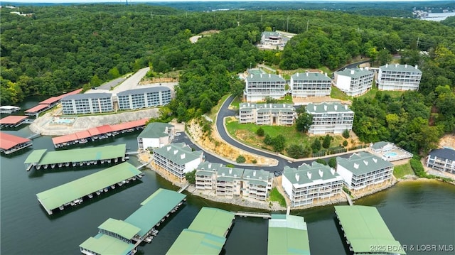 72 Emerald Bay Dr Unit 2D, Lake Ozark, MO 65049 - bird's eye view featuring a water view and a forest view