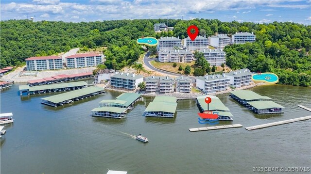 72 Emerald Bay Dr Unit 2D, Lake Ozark, MO 65049 - bird's eye view featuring a water view