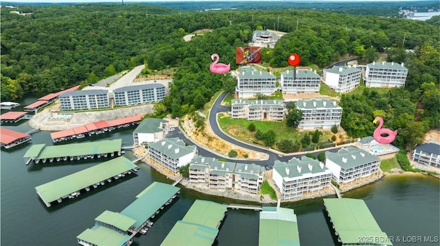 72 Emerald Bay Dr Unit 2D, Lake Ozark, MO 65049 - drone / aerial view with a water view and a view of trees