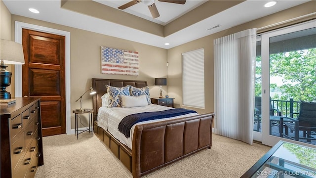 559 Forestridge Ln, Sunrise Beach, MO 65079 - bedroom featuring light carpet, multiple windows, access to outside, and recessed lighting