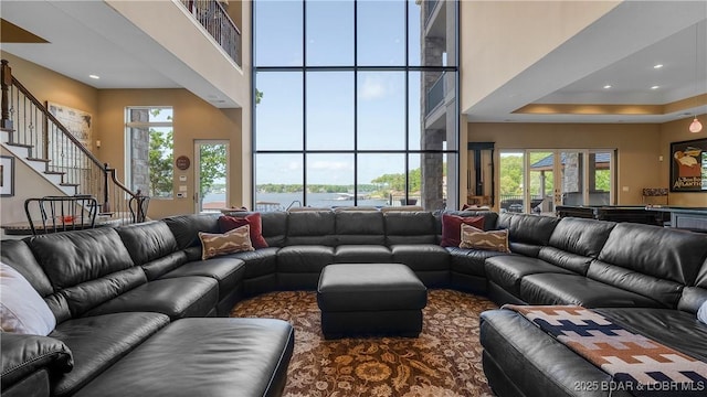 559 Forestridge Ln, Sunrise Beach, MO 65079 - living area with a towering ceiling, stairway, healthy amount of natural light, billiards table, and recessed lighting