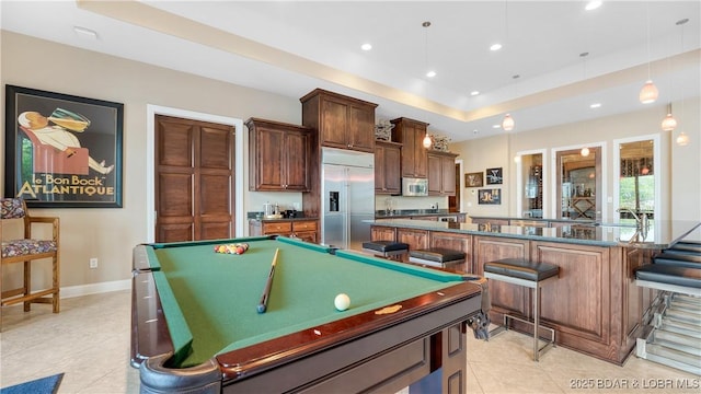 559 Forestridge Ln, Sunrise Beach, MO 65079 - rec room with light tile patterned flooring, a raised ceiling, recessed lighting, billiards table, and baseboards