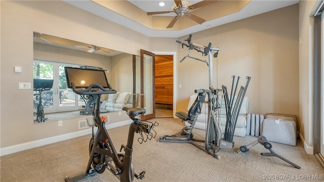 559 Forestridge Ln, Sunrise Beach, MO 65079 - workout room with ceiling fan, carpet flooring, baseboards, and a raised ceiling