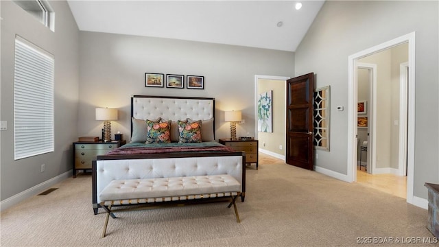 559 Forestridge Ln, Sunrise Beach, MO 65079 - bedroom featuring light carpet, baseboards, and high vaulted ceiling