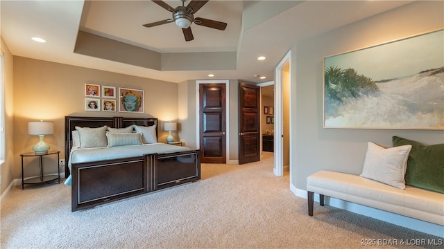 559 Forestridge Ln, Sunrise Beach, MO 65079 - carpeted bedroom with baseboards, a raised ceiling, recessed lighting, and a ceiling fan