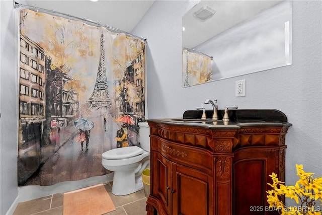 bathroom with tile patterned flooring, a shower with shower curtain, toilet, and vanity