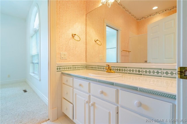 188 Bur Oaks Rd, Camdenton, MO 65020 - bathroom with vanity and tasteful backsplash