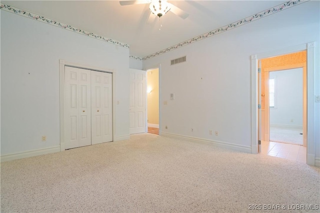 188 Bur Oaks Rd, Camdenton, MO 65020 - unfurnished bedroom featuring carpet, a closet, and ceiling fan