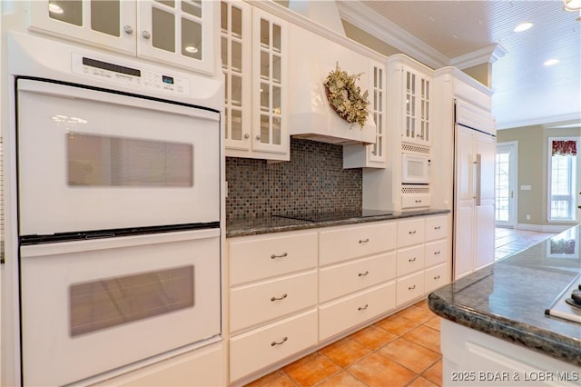 188 Bur Oaks Rd, Camdenton, MO 65020 - kitchen featuring white appliances, ornamental molding, light tile patterned floors, backsplash, and white cabinets