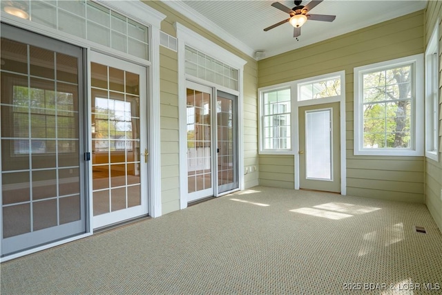 188 Bur Oaks Rd, Camdenton, MO 65020 - unfurnished sunroom with a ceiling fan