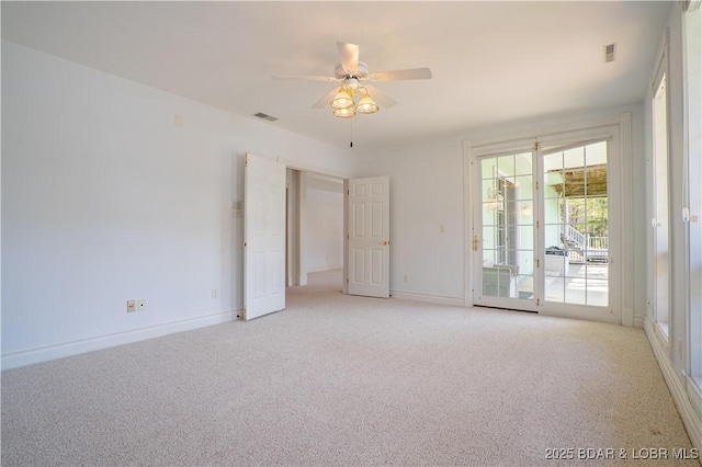 188 Bur Oaks Rd, Camdenton, MO 65020 - empty room featuring light carpet and a ceiling fan