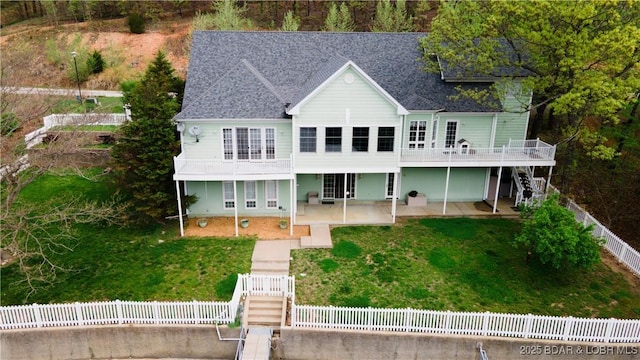 188 Bur Oaks Rd, Camdenton, MO 65020 - view of front of property with stairs, a patio, a wooden deck, and a shingled roof