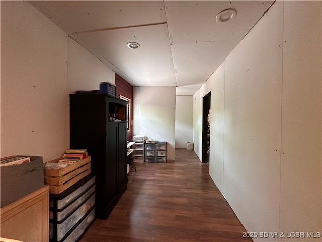 hallway with wood finished floors